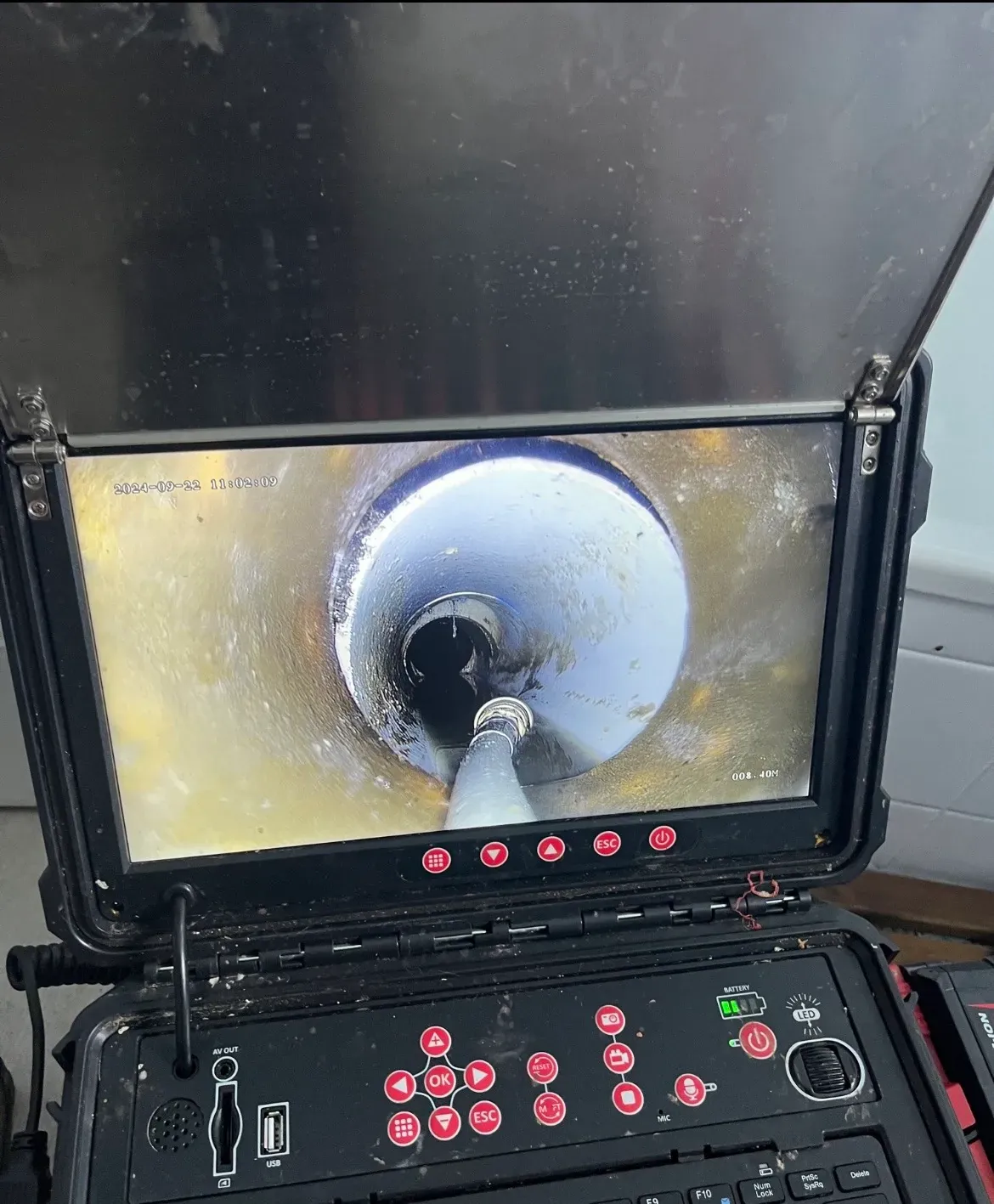 CCTV drain camera inspecting the inside of a drain pipe