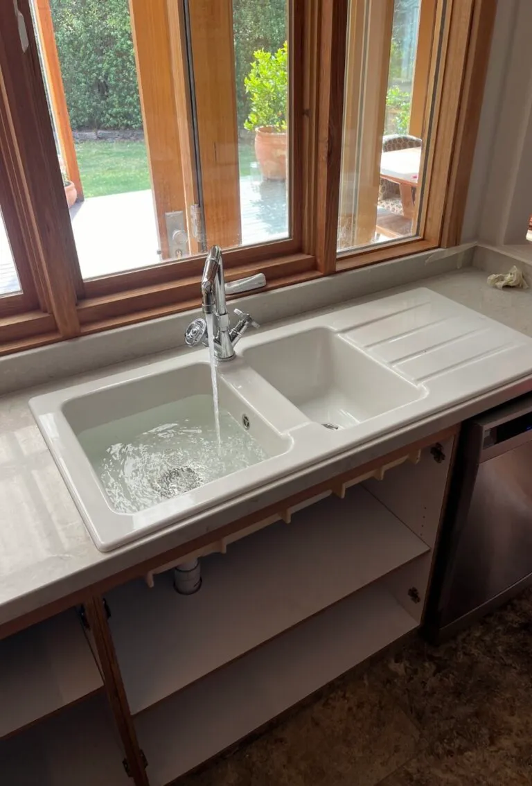 Double kitchen sink and mixer tap installed in a new home – Leopold plumber
