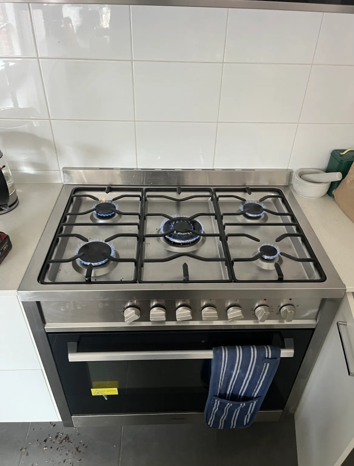 Freestanding gas cooktop and oven installed