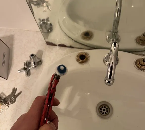 Plumber replacing a basin tap washer – Leopold plumber