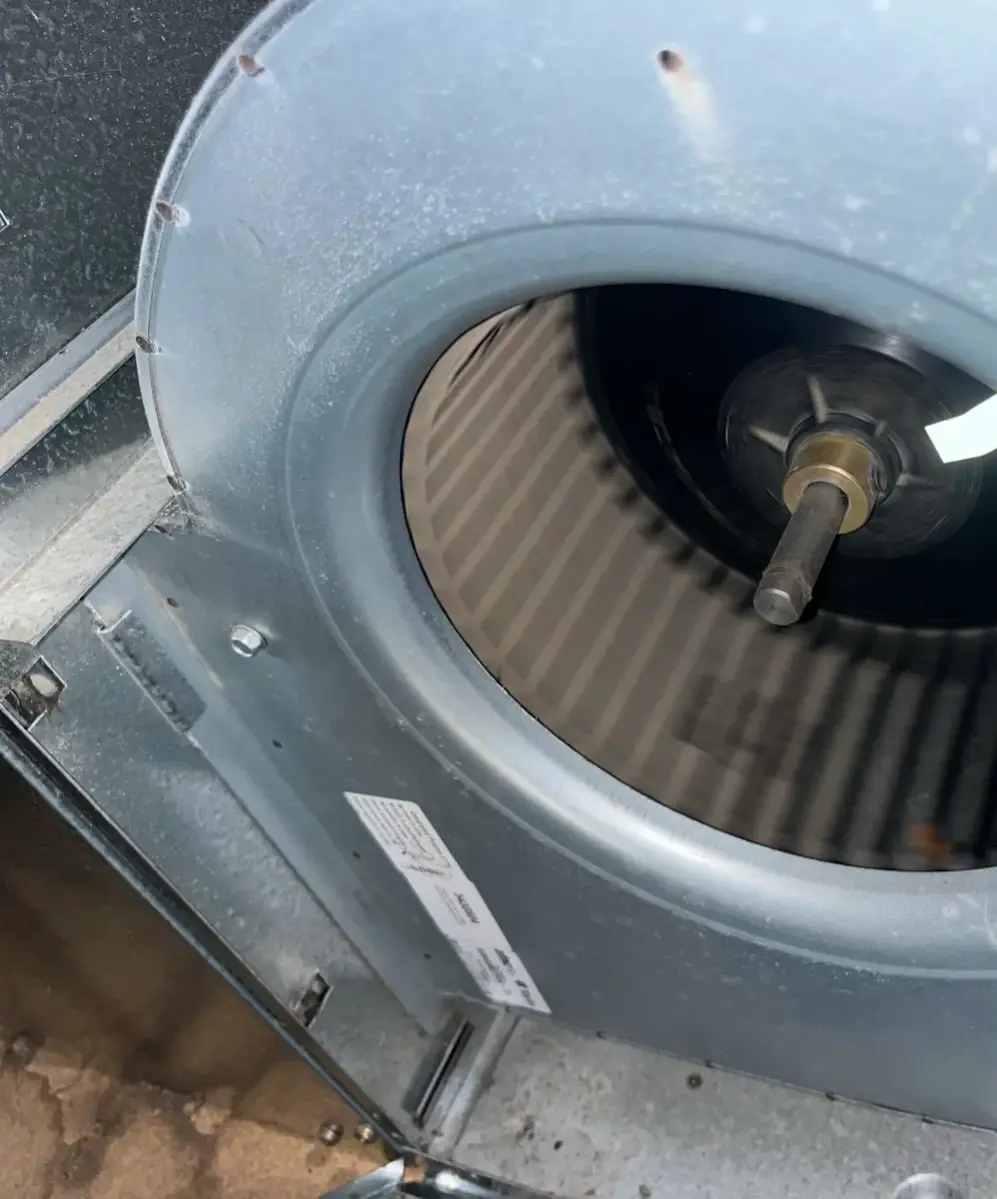 Close view of a fan blower inside a heater