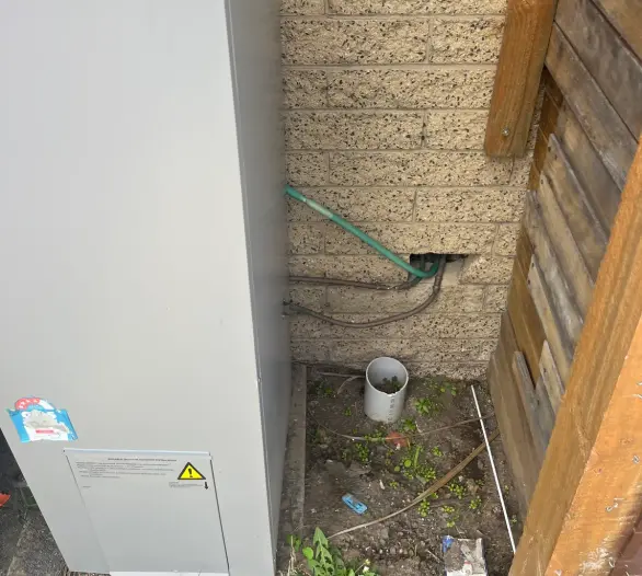 Gas storage hot water unit with a relief valve and drain pipe